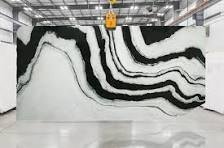 Panda White marble slabs with bold black and white banding